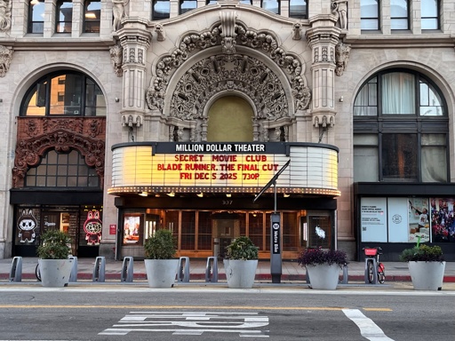 A marquee for Million Dollar Theater. The marquee itself says Secret Movie Club, the group organizing the screening. The movie itself is Blade Runner: The Final Cut.