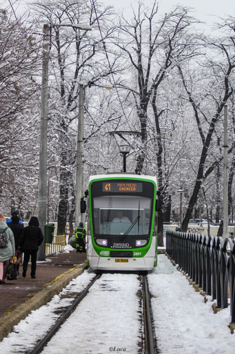 Astra Imperio Metropolitan tram running through the snow at the turning loop in Piața Presei