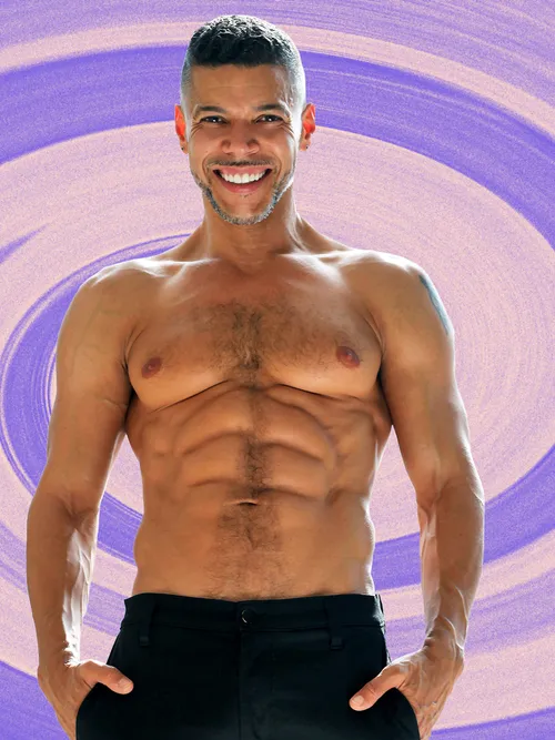 A photo of a smiling, shirtless Wilson Cruz, clearly displaying that he does, in fact, work out.