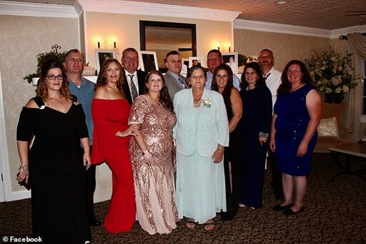 Grace Fusco (middle) and her 11 children would normally eat large classic Italian family meals in Freehold Township, New Jersey.